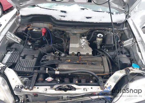 1999 Honda Cr-V Ex z USA, uszkodzony, nr VIN JHLRD1869XC054628